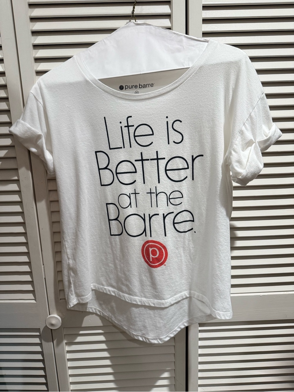Pure Barre White Short Sleeve Tee with Black Text and Red Logo
